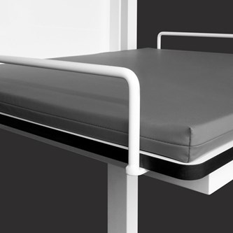 Sikkerhedsbøjler til puslebord